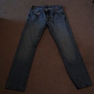 Men’s light wash jeans.